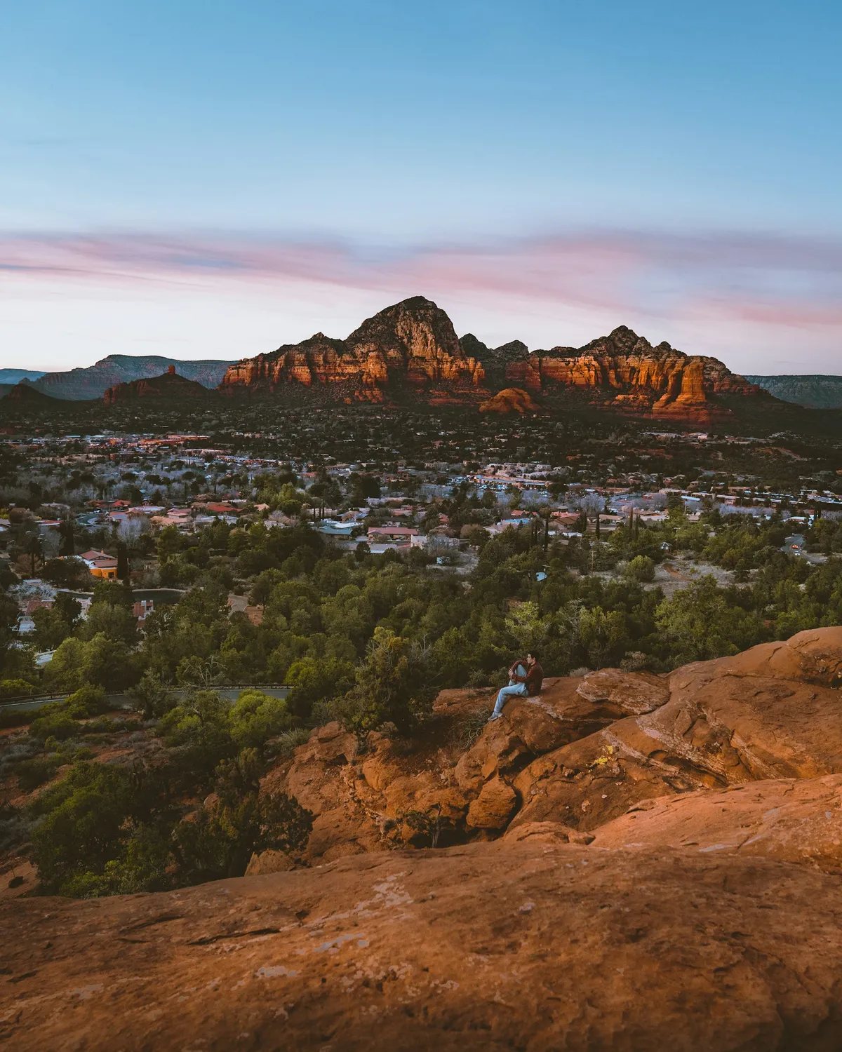 Desert mountain landscape at sunset with red rock formations